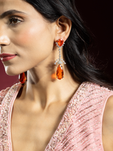 Rhodium Plated Earrings with Zircon and Orange Stones
