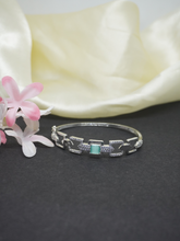 Rhodium-Plated Green Stone Bracelet with American Diamond