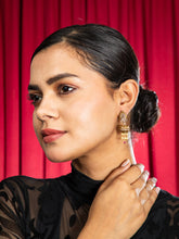 Traditional pearl jhumka earrings with gold finish and hanging beads, stylish ethnic jewelry for women