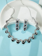 Rhodium Plated Wave Design Necklace with Black Meenakari and Matching Long Earrings