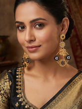 Matte Gold Plated Peacock Earrings with White Kundan and Black Beads