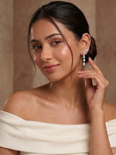 Rhodium Plated White AD Statement Earrings