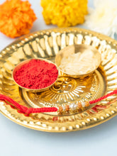 Sacred Silver Om Rakhi with Red Thread & Chandan Beads