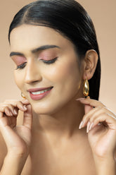 Gold Toned Oval Hoop Earrings