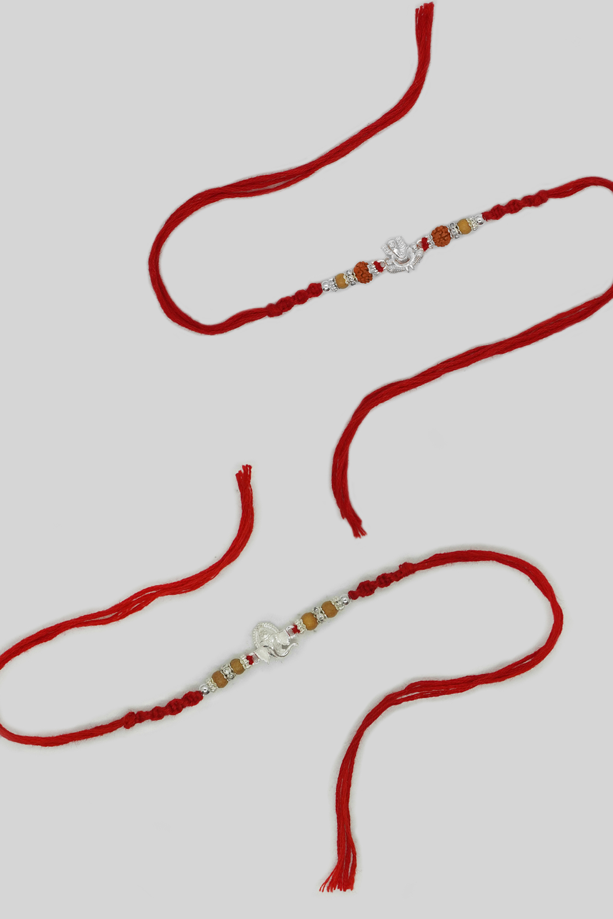 925 Sterling Silver 2 Ganesh Rakhi with Beads - Silver Rakhi Online
