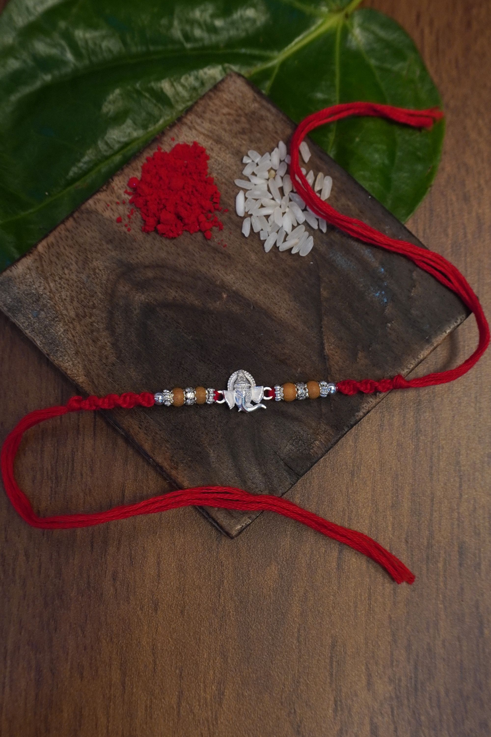 925 Sterling Silver 2 Ganesh Rakhi with Beads - Silver Rakhi Online