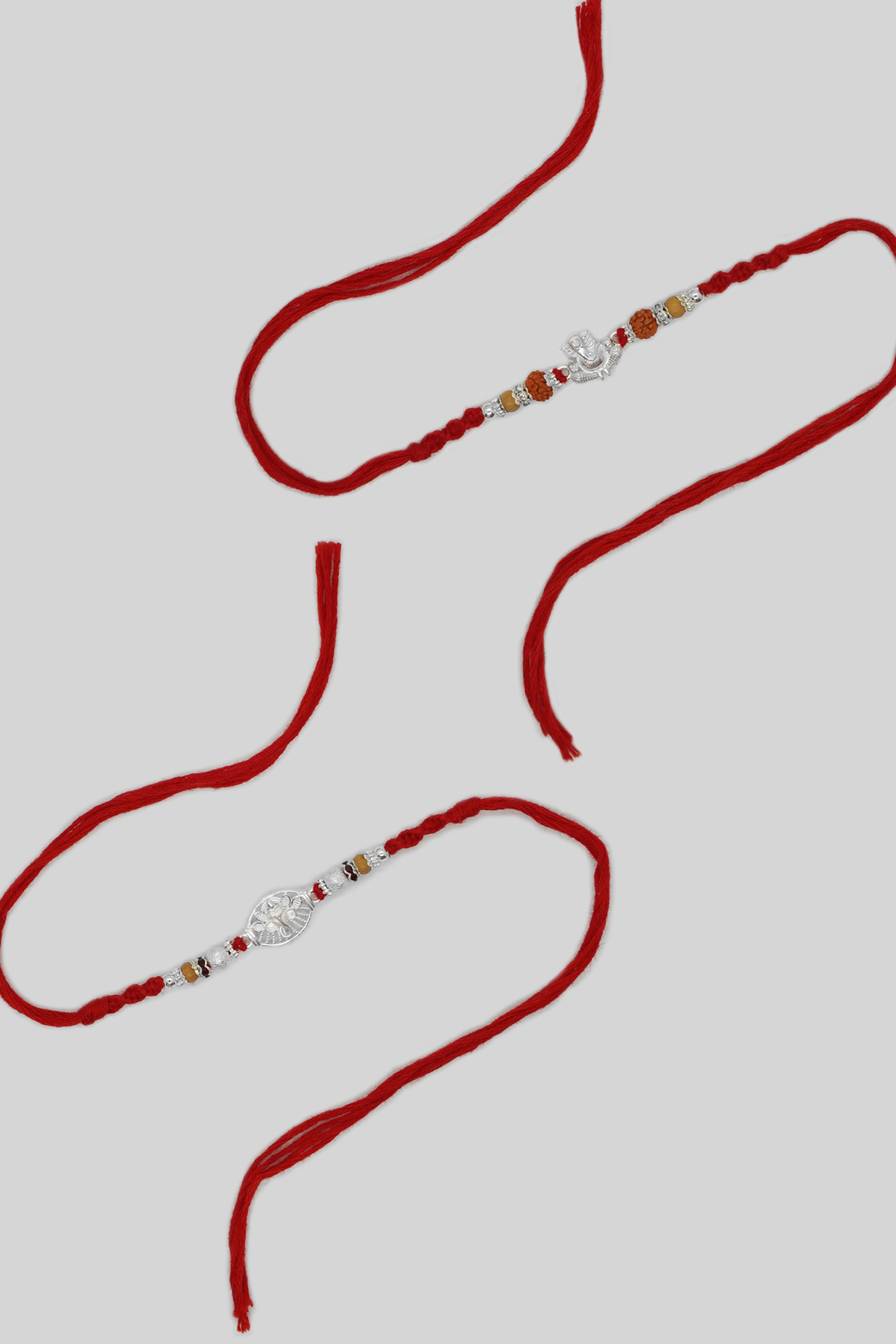 Sterling Silver Designer Ganesha Dome & Om Combo Rakhi - Best Rakhi Design