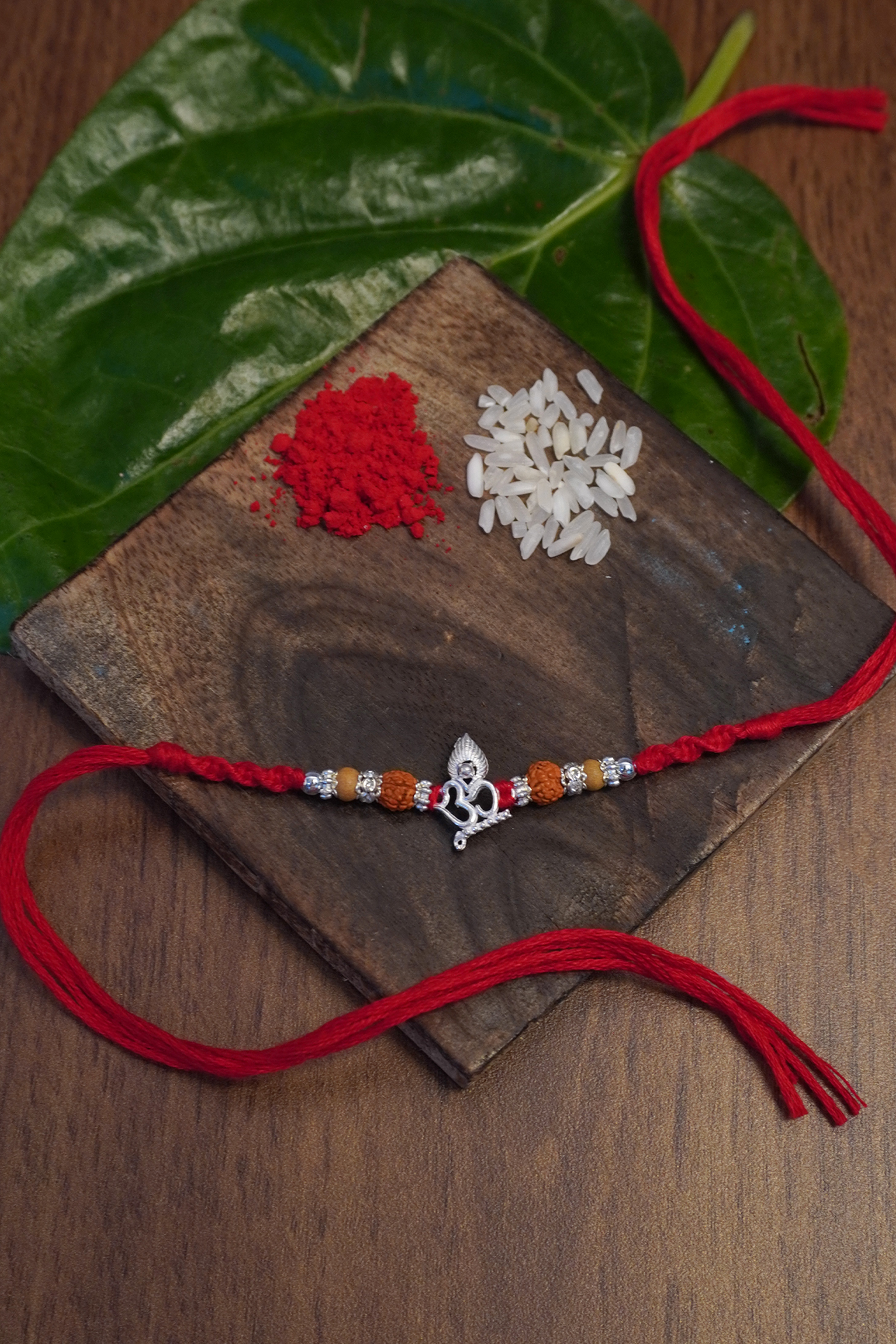 Sterling Silver Om Combo Rakhi - Rakhi Design