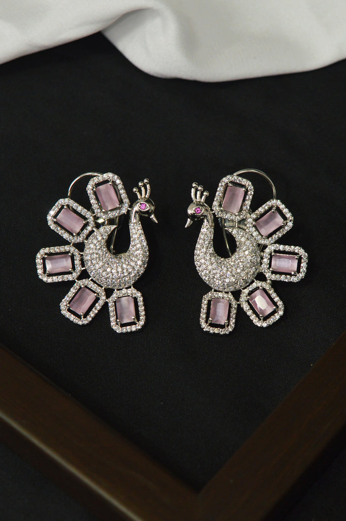 Dancing Peacock Rhodium Plated Pink Stone Studded Earring - Earrings Traditional Design