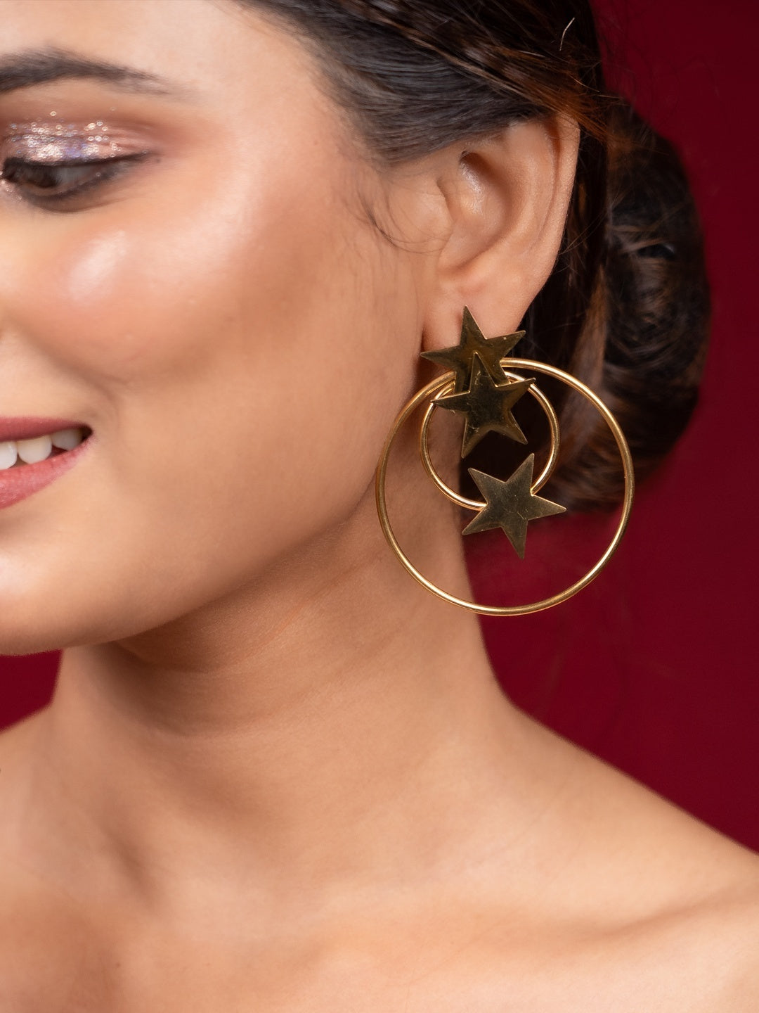 Gold-Plated Hollow Butterfly Drop Earrings with Emerald Accents