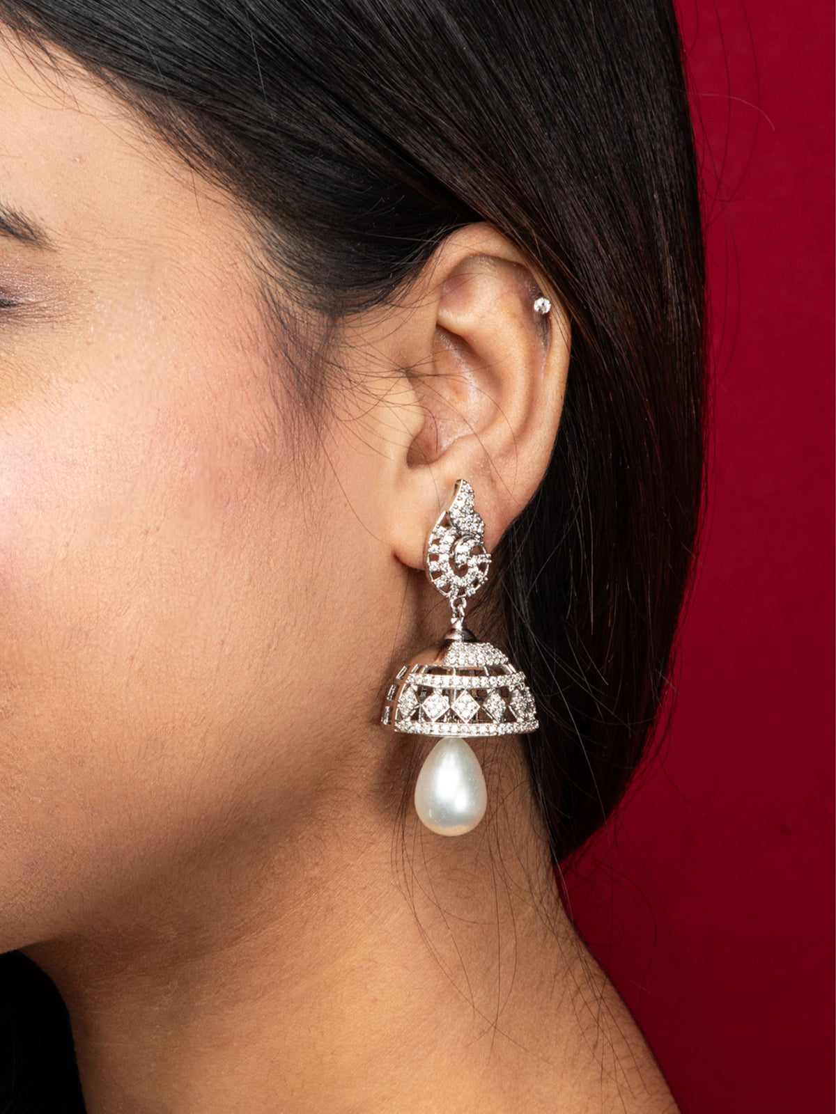 Rhodium AD Stone Jhumka Earrings with White Water Drop Faux Pearl