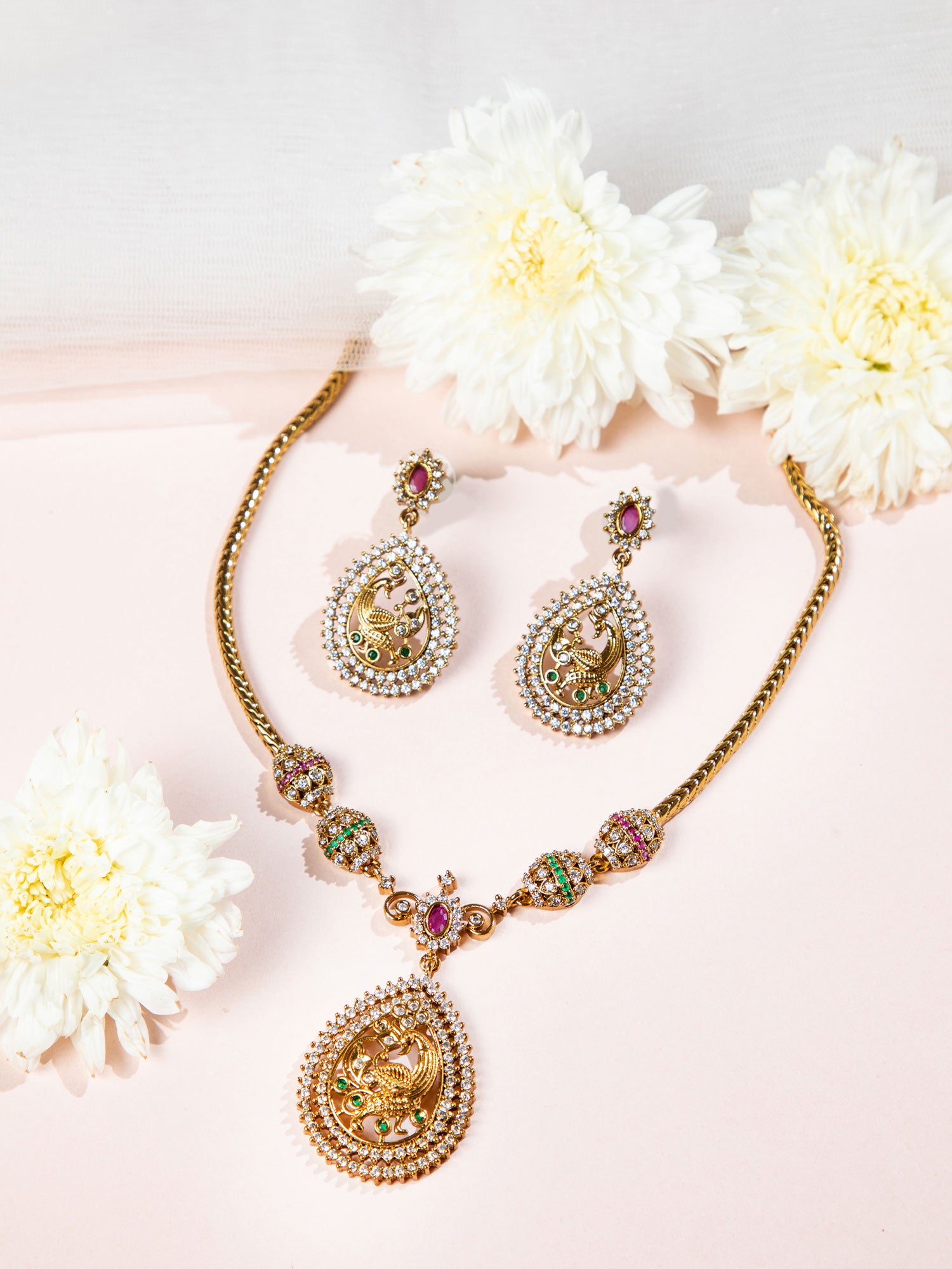 Traditional temple jewellery necklace set with intricate peacock design