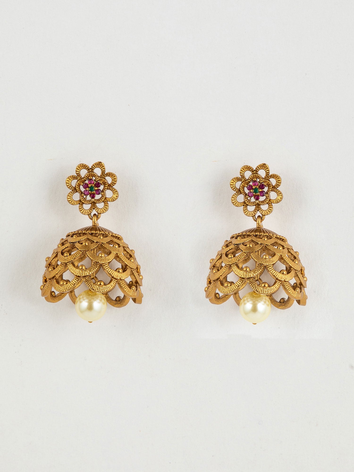 Traditional gold plated jhumka earrings with pearl drop