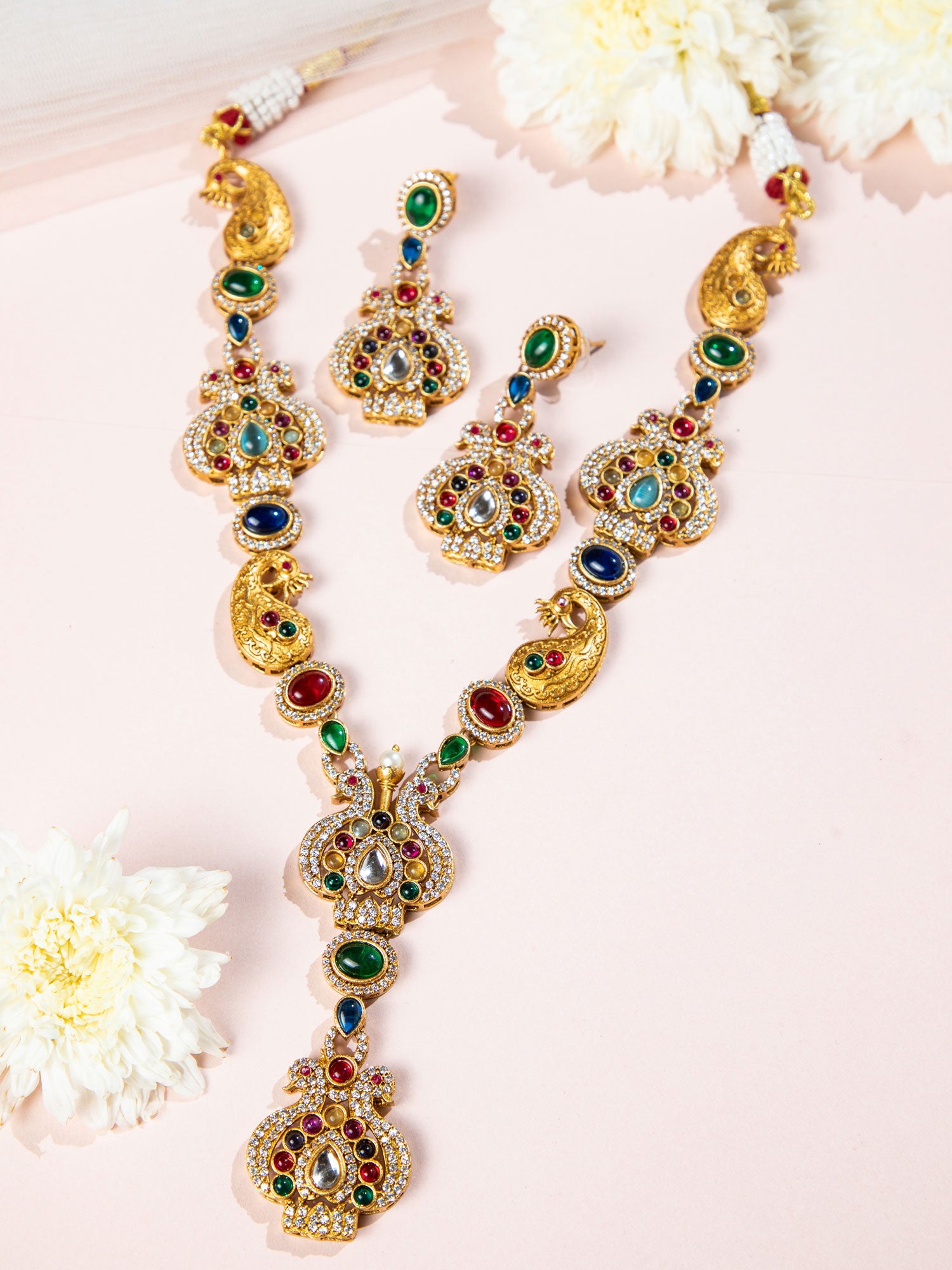 Traditional gold plated jhumka earrings with matching peacock necklace set 