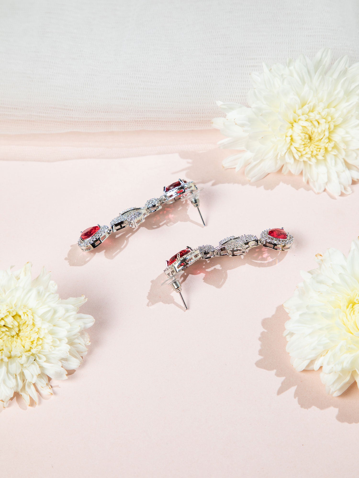 Red stone necklace set with floral motif and matching earrings