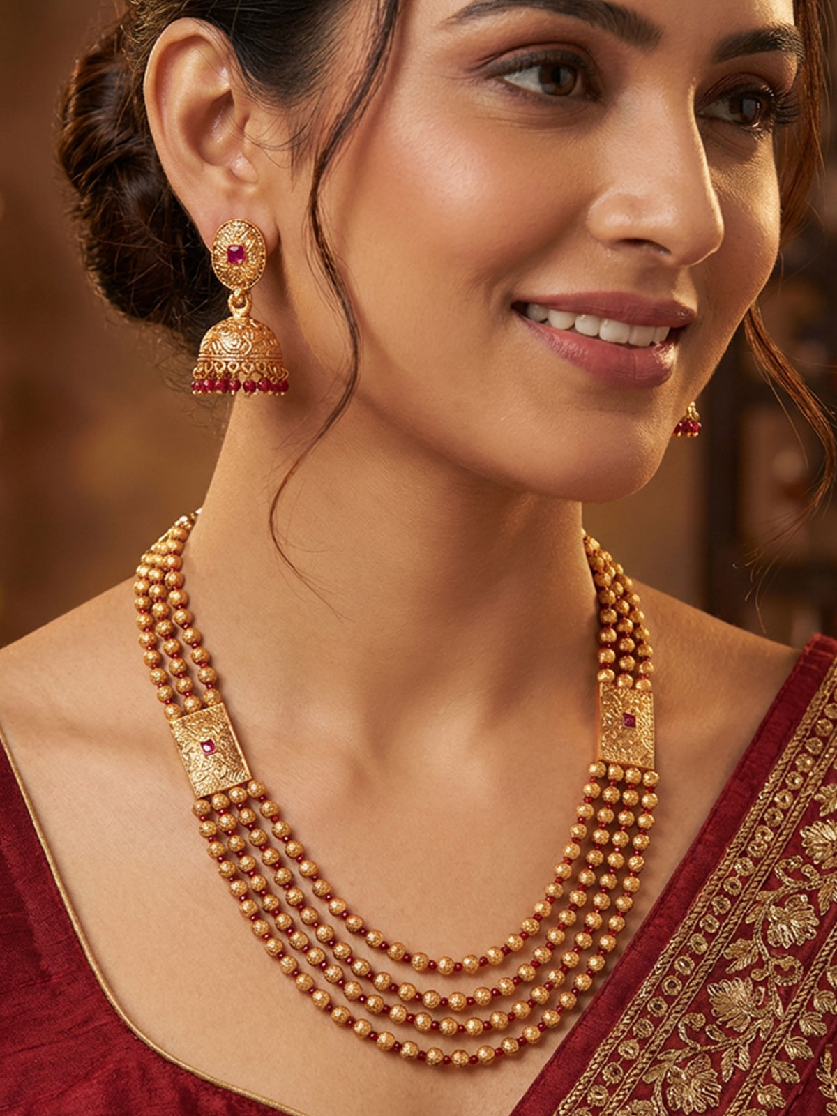 Gold Plated Multilayered Matar Mala Long Necklace with Red Stones and Matching Jhumki Earrings