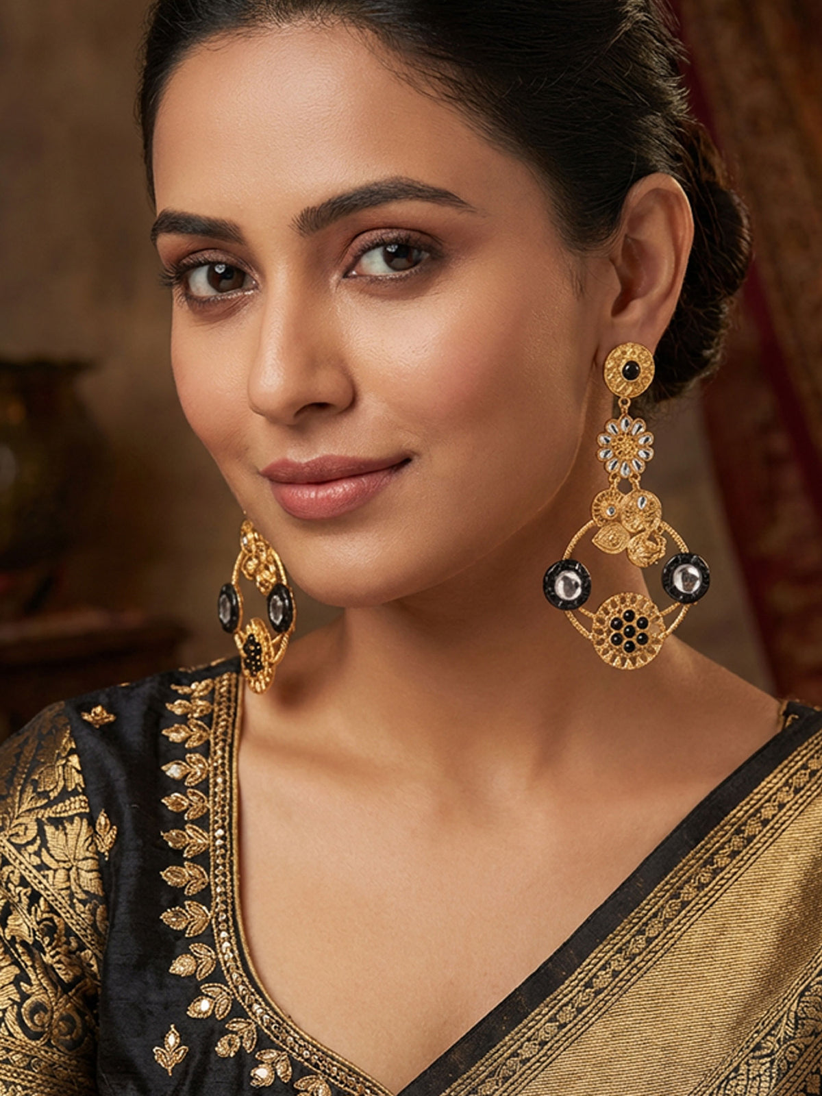 Matte Gold Plated Peacock Earrings with White Kundan and Black Beads
