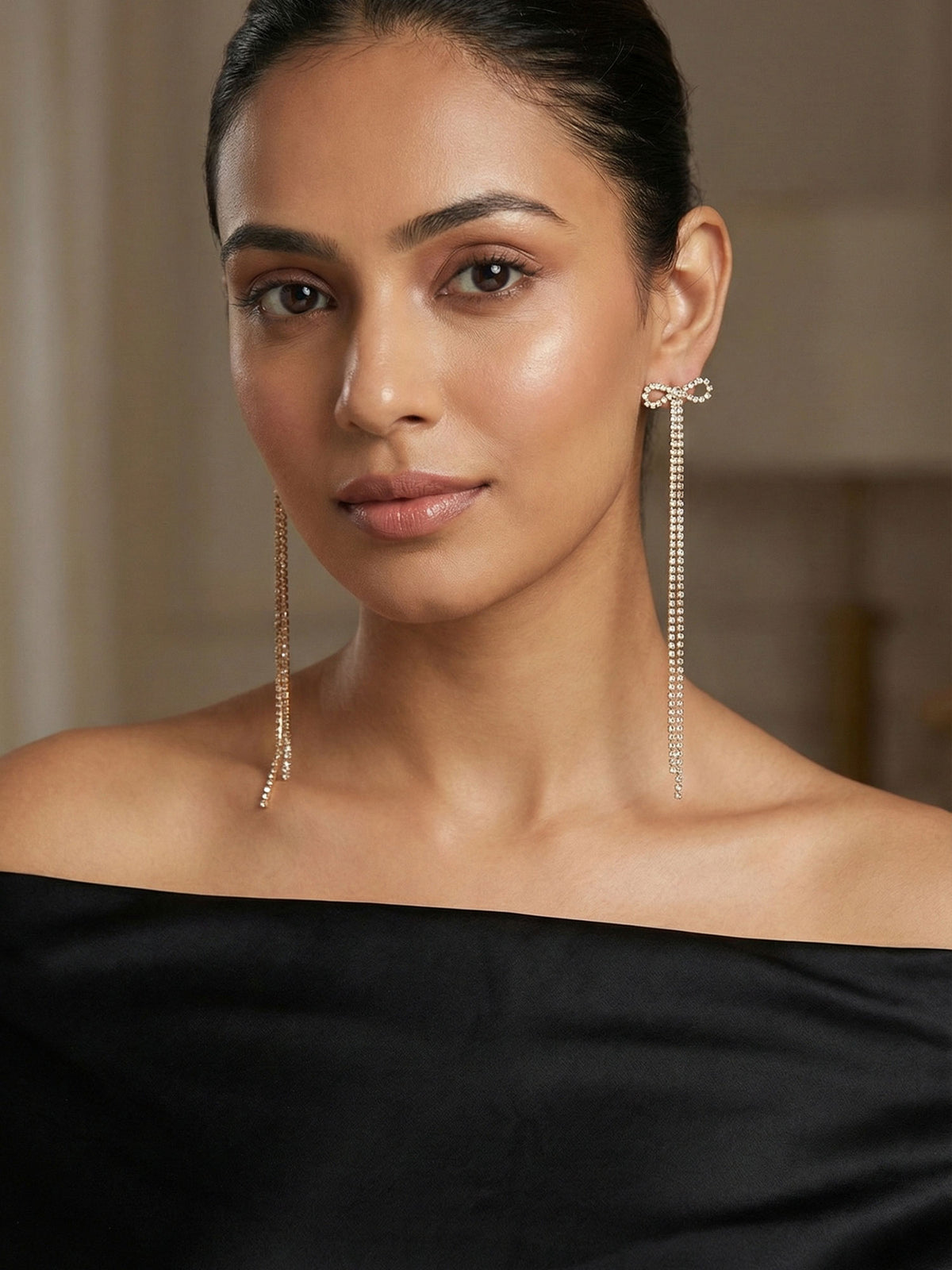 Gold Plated Bow Design Long Earrings with White AD Stones