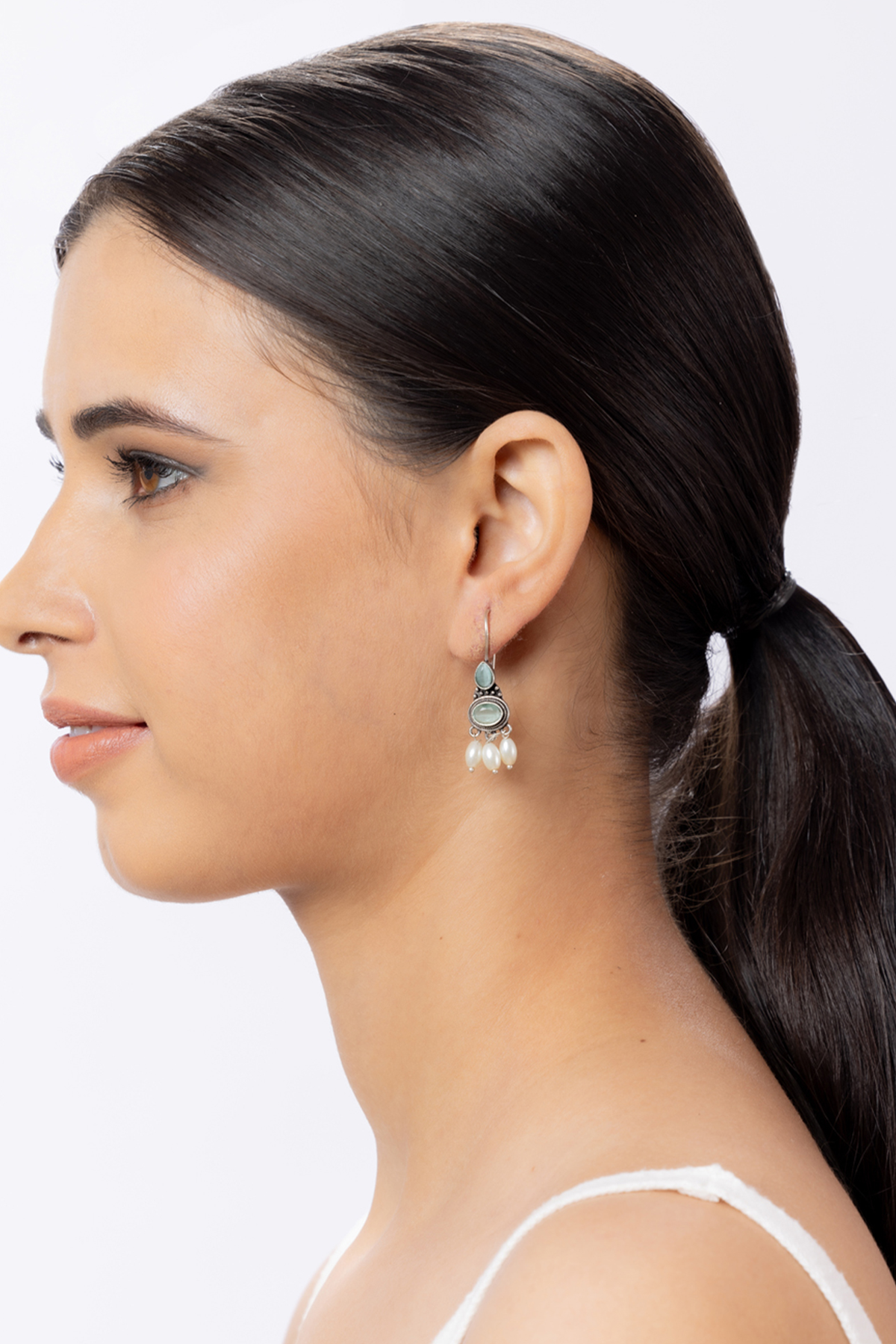 Oxidised earrings with Light blue stone and pearl