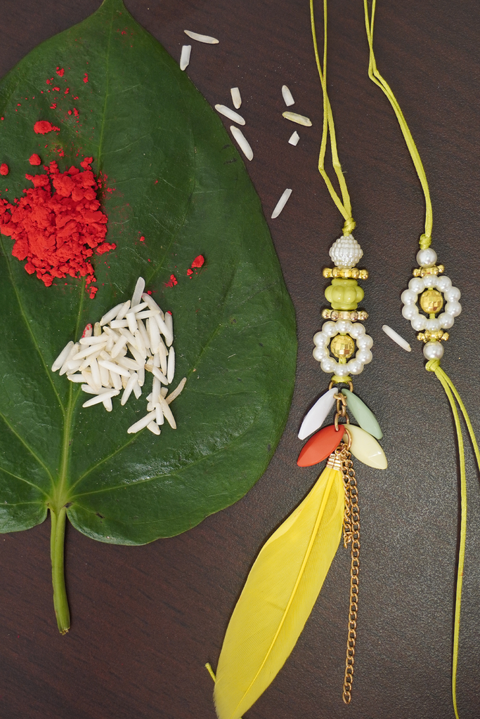 Handcrafted Couple Rakhi with pearl work - Handmade Rakhi With Thread