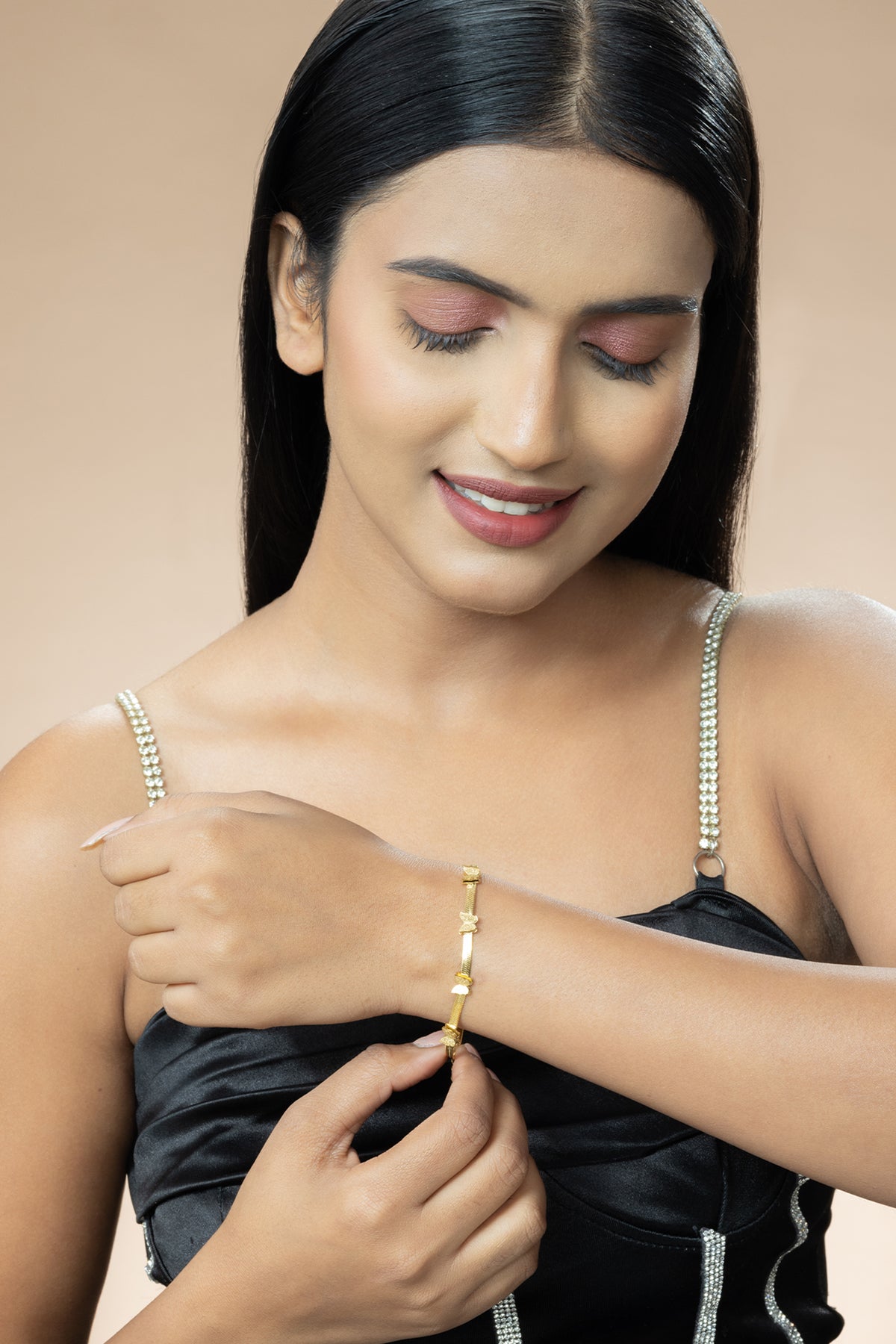 Gold Toned Snake Chain Bracelet with Gold-Plated Butterfly Design