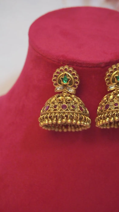 Gold Plated Pink Stone Jhumka in Matte Finish