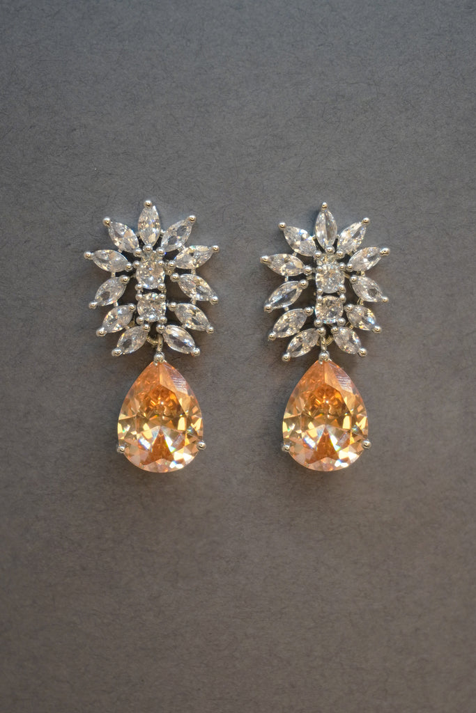White Stone Studded American Diamond Sliver Plated Earring - Earrings Design