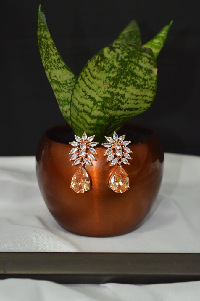 Designer Orange Stone Studded American Diamond Earrings - Niscka 