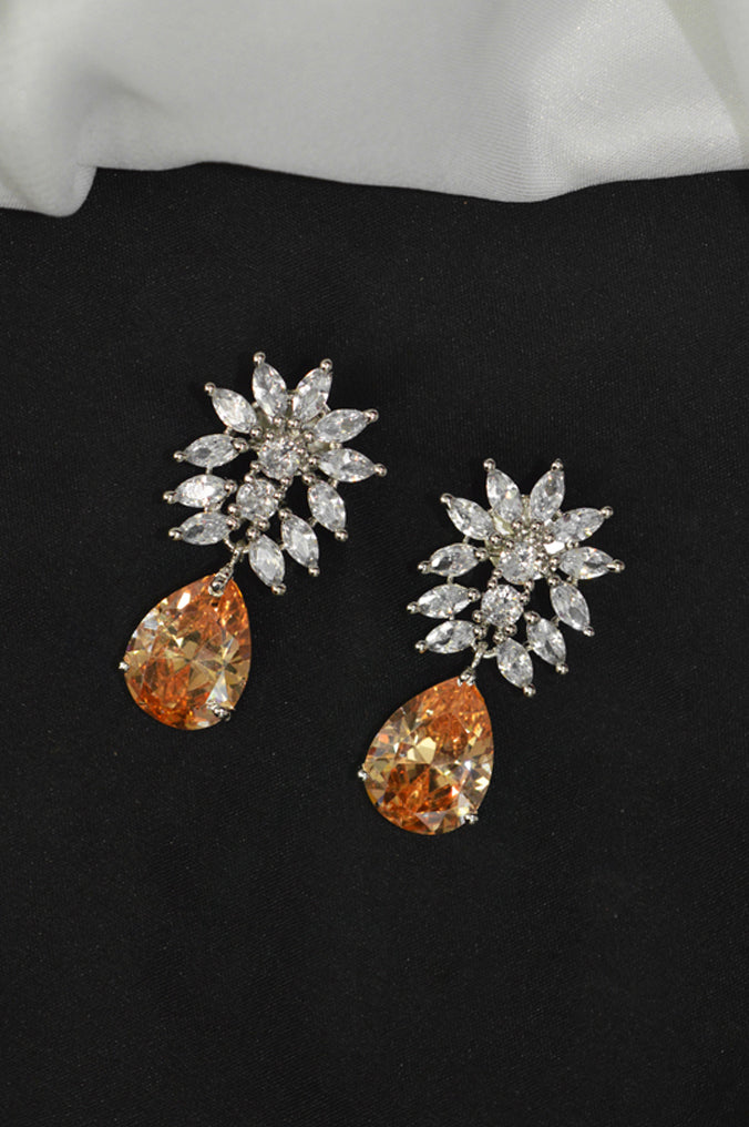 White Stone Studded American Diamond Sliver Plated Earring Online - Niscka 